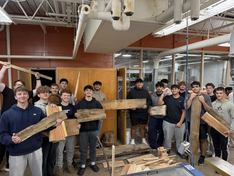 students with wood donation