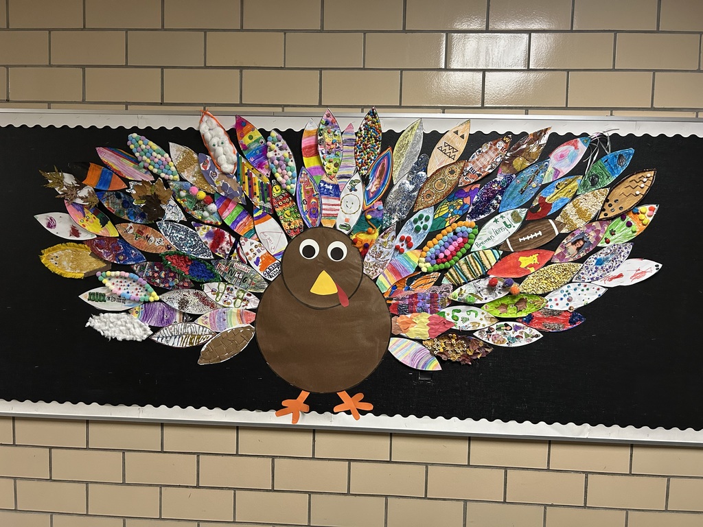 1st Grade Turkey with students homemade leaves