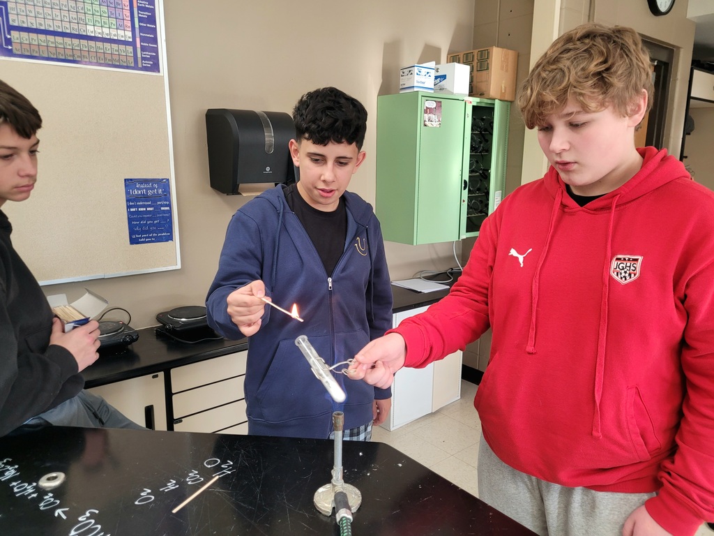 2 boys working in science class