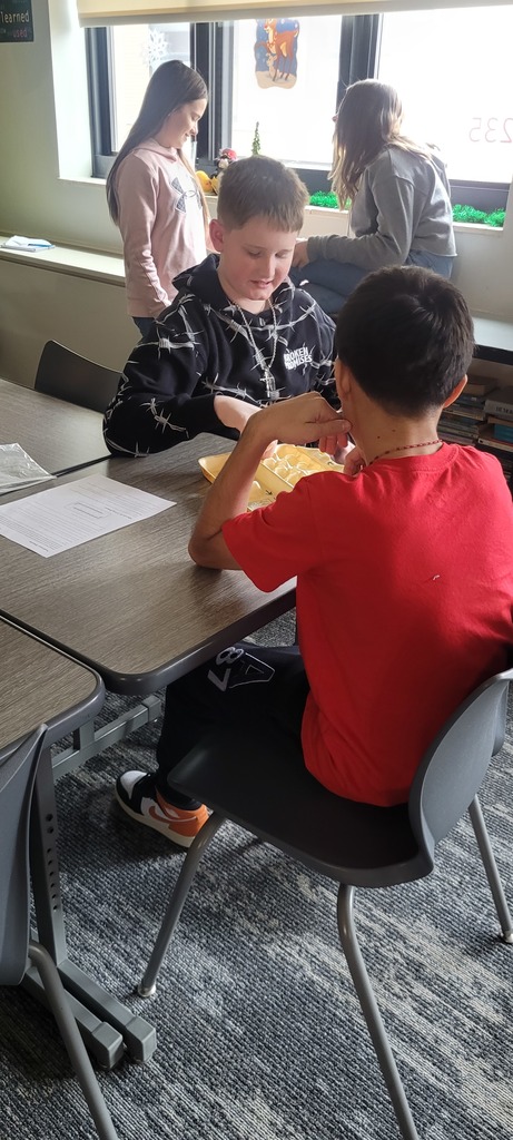 2 boys working together