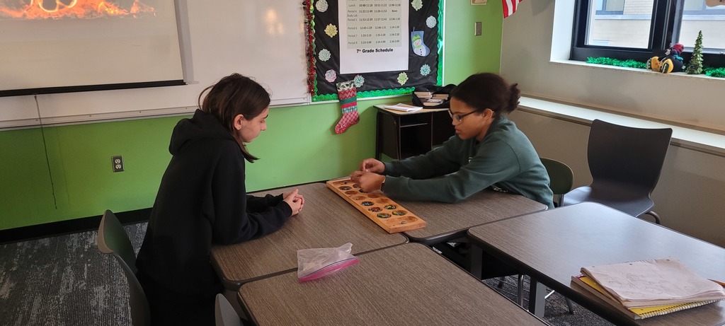2 girls playing a game together