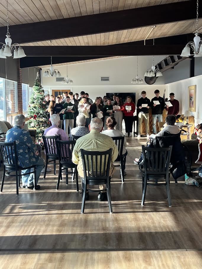 large group of students caroling