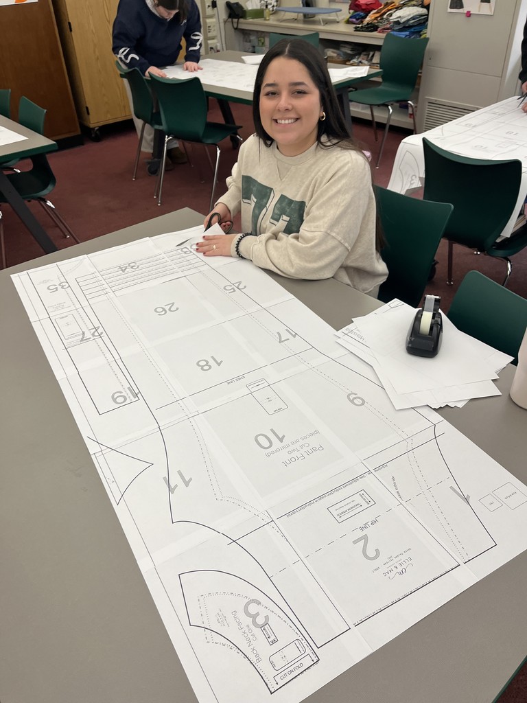 BHS Student working cutting of PJ pant pattern. 