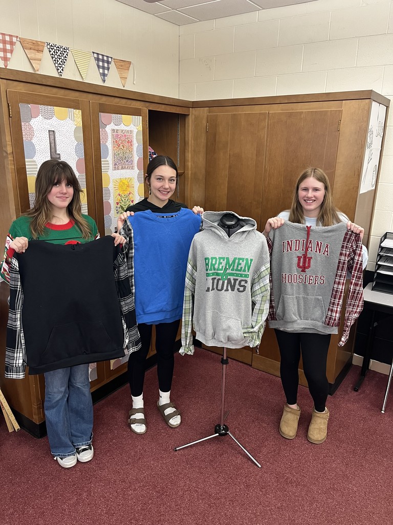 BHS Students showing off their sewing creation! Fannel Hoodies!