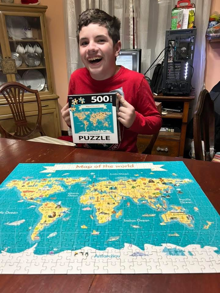 kid with puzzle 