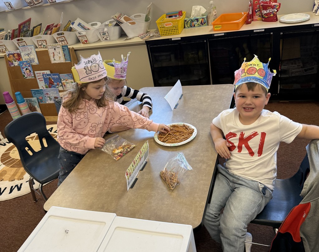 3 students counting pretzles