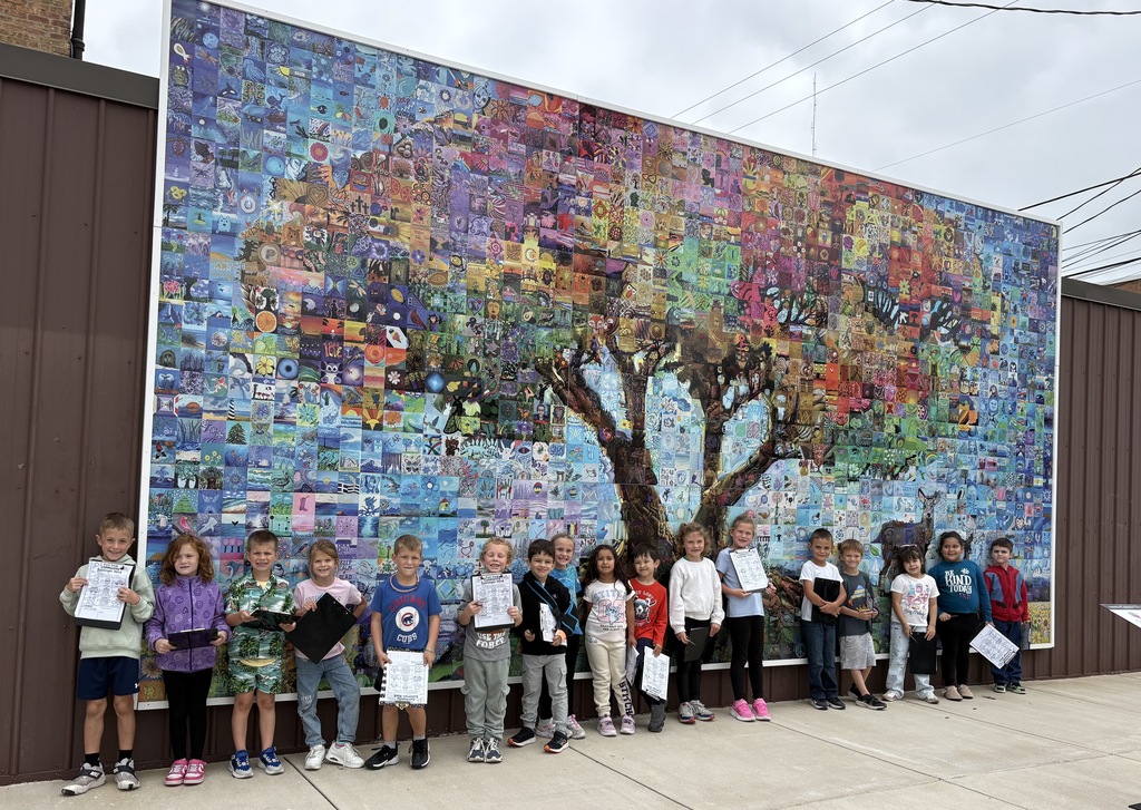 Students in front of the mural