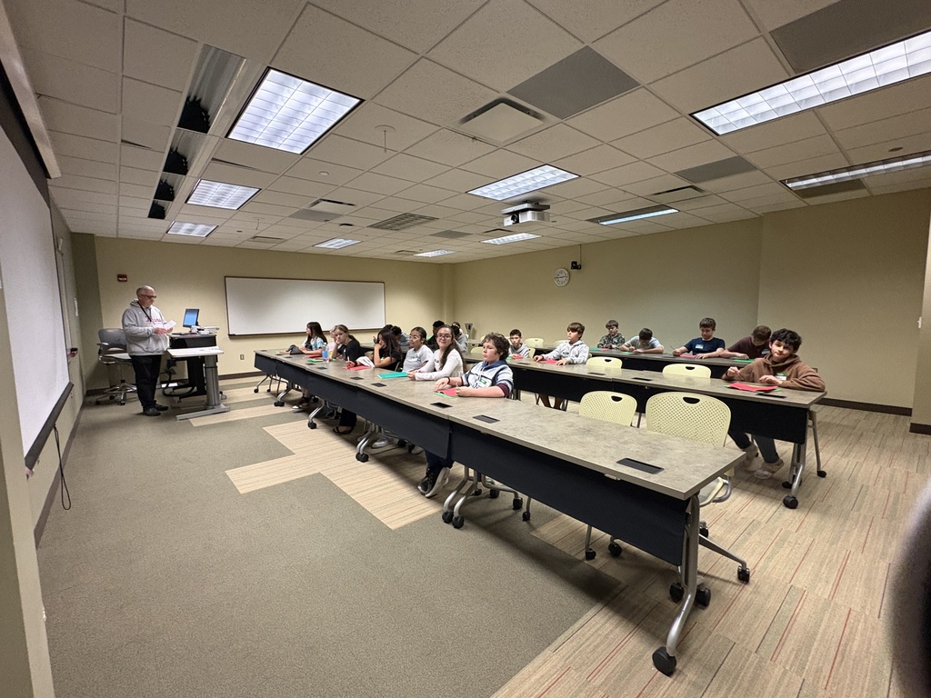 A group of students in classroom.
