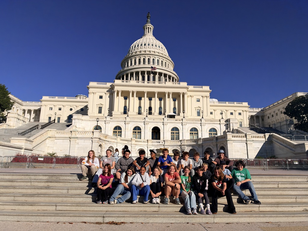 A group of 8th grade students in front of the Capitol Building in Washington DC