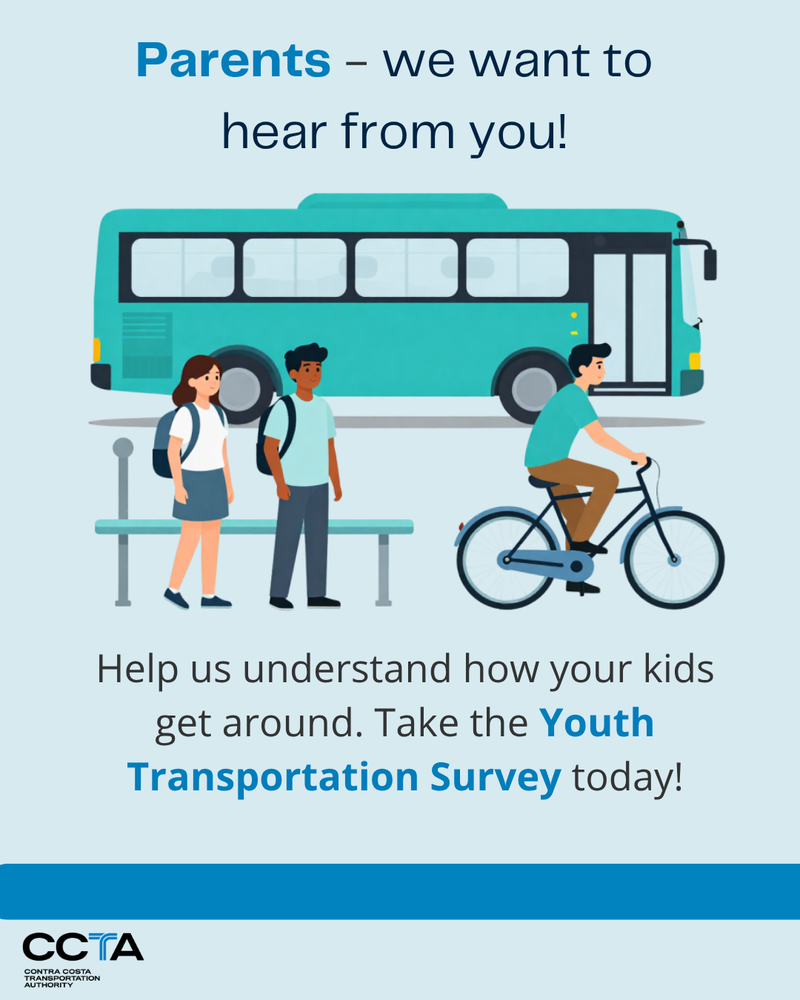 Image of two students with backpacks on waiting on the bus while another student biking pass them