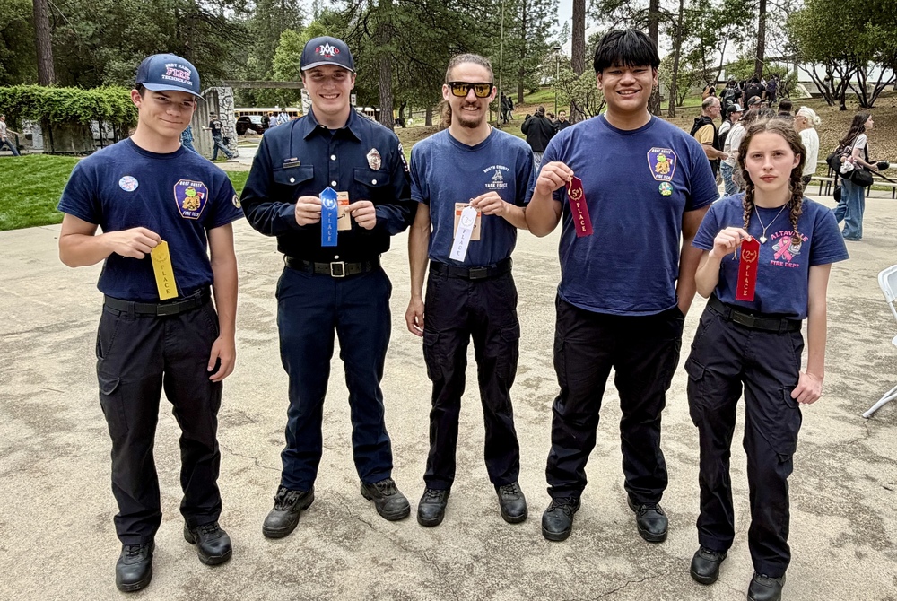 Columbia Occupational Olympics featuring fire tech students with ribbons
