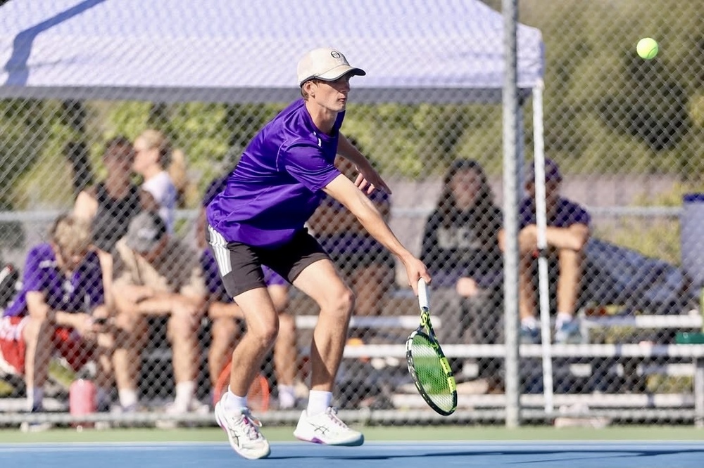 Jonathan Carter playing tennis vs Riverbank on April 28