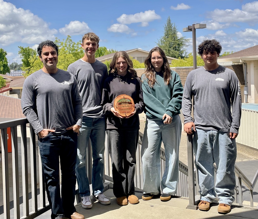 Forestry Club holding 4th place prize from state competition