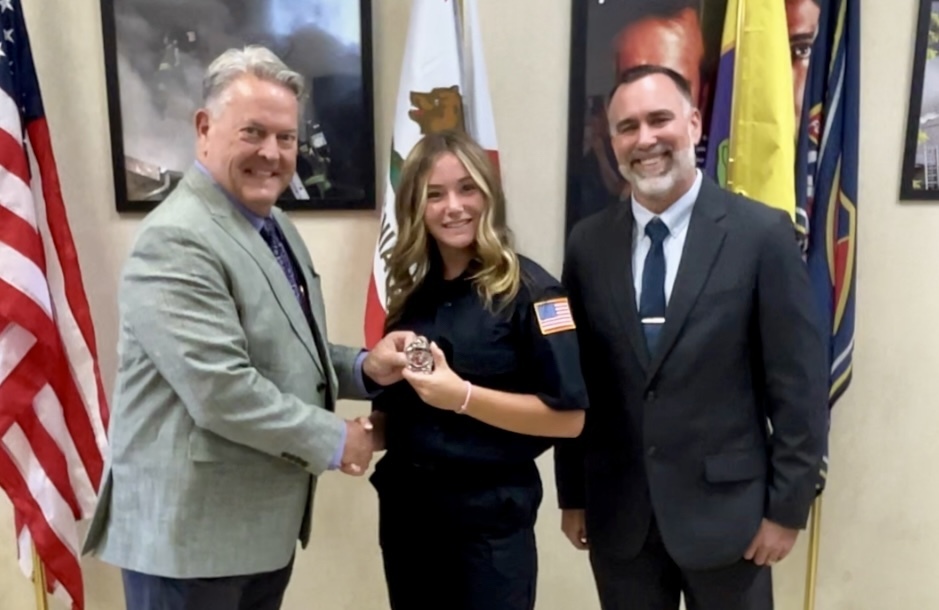Nanik , Penelope Thompson, Holt during badge ceremony