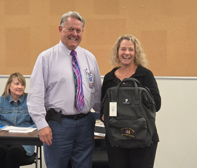 Ms. Truman being honored at Governing Boad meeting