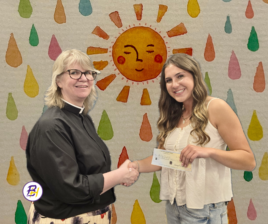 Check presentation with Reverand Mathews and Bailey Deplitch with artwork in the background