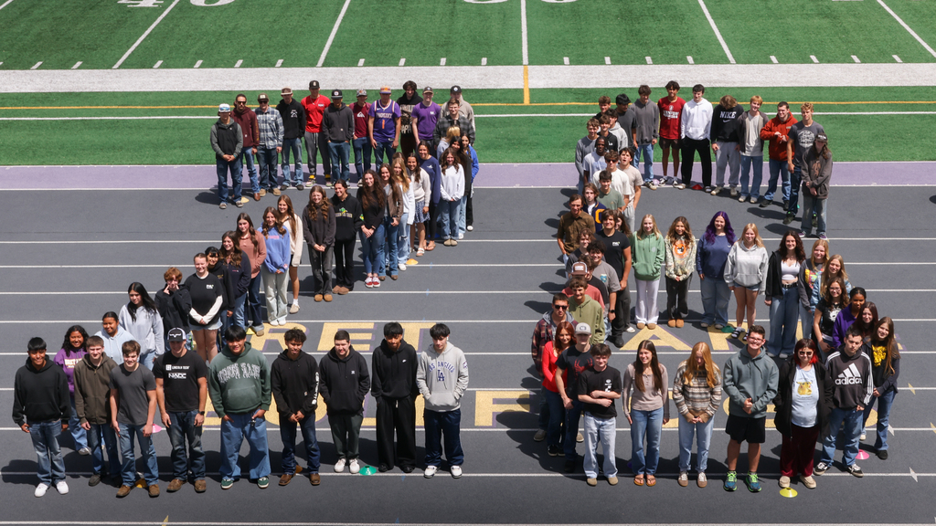 Class of 2026 seniors in human formation form of 26