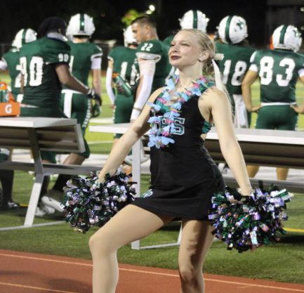 Miracles Dancer brings spirit to the football game. Friday night are a lot more fun with her on the sidelines!  MHS Miracles Dancer,  Ciara Kelley grade 9 performs a energetic routine at friday night football game, bringing spirit and excitement to the stands. Kelley has had multiple years of dance experience and has been looking forward to joining MHS Dance team. Before friday's game she says “It’s fun being on the sidelines and seeing everyone light up from the stands”.    Photo creds: Caroline Schneider                                                                                                                                                                                                                                                                                                                                                                                                                                                                                                                                                                                                                                                                              