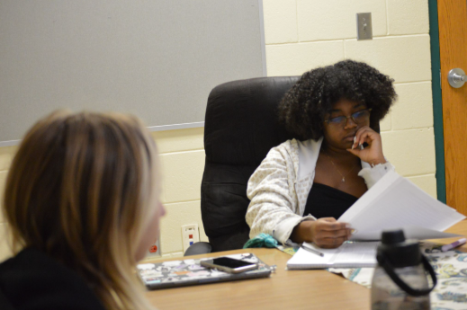 A NEW CHAPTER. Members of the book club gather together to discuss about what book they will read next. Anielle Wight (12), the club president discussed with members in Ms. Braun’s room about what they should read first, before coming to a conclusion. When Wight was asked what what genre she wanted the book to be, she said, “I hope to read more fantasy novels this year in book club, I like the genre and other members seem to like it too”. Photo taken by Melissa Amaro