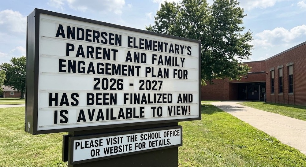 This picture is an image of a sign outside of a school that says "Andersen Elementary's Parent and Family Engagement Plan for 2026 - 2027 has been finalized and is available to view!"