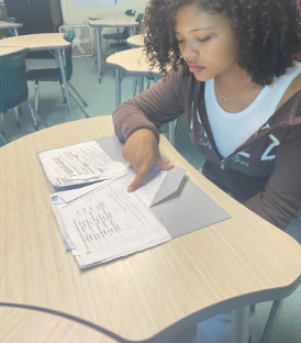 Caption: ENV SCI: In Environmental Science class, Students have spent weeks on preparing for the Ducks Unlimited testing, held in the media center on March 11. This test covered everything students have been learning in class, and everything had been leading up to that moment in the media center. Students prepared through online practice quizzes. The day of the test, Students attended the class and had a big free breakfast. Coger said, “This class is very supportive and ensures your success.” Photo by Princess Islam