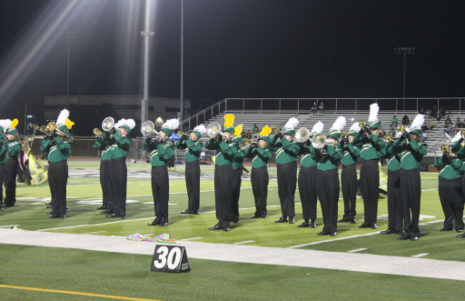 Marching With Madness; Melbourne High School’s Marching Band is performing during The Halftime Performance at Senior Night and 8th grade night on Friday. After weeks of practice, they got to show their hard work and discipline off. Trombone player, Olivia Griffin said, “Nobody recognizes the amount of effort and dedication we put into everything we do.” Every step and note that they played showed dedication and enthusiasm. Photo by NeAsia Taylor
