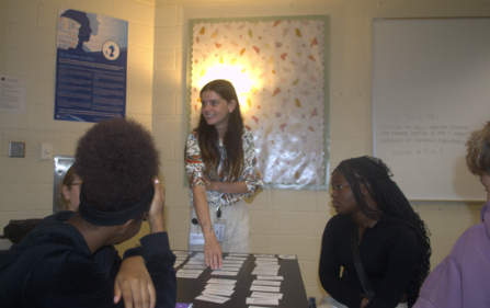 Students explore the building blocks of life.: Mrs. Lia Todd, a new teacher at Melbourne High School helps her students with biology flash cards with great passion in her 4th period class. She started the activity with her students to help them understand the topic of cells more, and help them prepare for upcoming tests. Todd believes that biology should be something that all students should know. “I believe that biology helps us take care of ourselves,” she said. Photo by: Matthew Trazzera