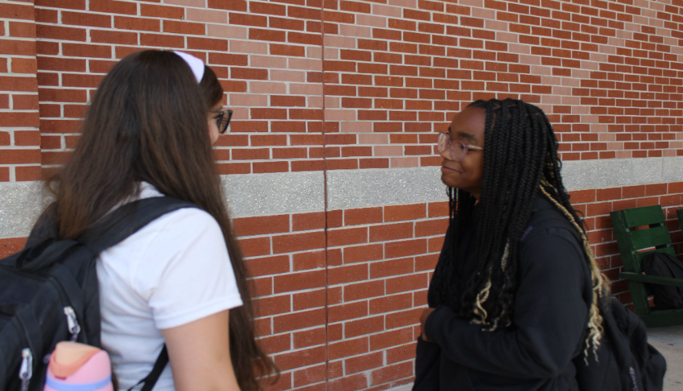 Building Connections Through Conversation Nylah Narbors and Camilla Dommaur. talk during lunch as they discuss  a friendship through shared schoolwork. Narbors and Dommaur worked together on multiple assignments during the school year in their classes, where they developed trust and improved communication. As classmates, they supported each other before tests and collaborated on projects, which helped them succeed academically. “We studied together before tests, and that made everything less stressful,” Narbors said. 
