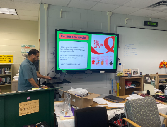 Caption: Take a stand! SWAT club is working against tobacco use amongst students. The club’s sponsor, Mr. Michael Soliven, promotes awareness through Red Ribbon Week and other school activities. Members meet every other Friday in Mr. Soliven’s room at 8:05 in the morning. Members discuss ways to promote a tobacco-free lifestyle. “ This club encourages students to make healthier choices,” Donald said. Photo by NeAsia Taylor