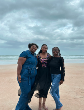 Mikayla Clark and two of her coaches at the beach for a celebration after they scored 3rd place in their competition.