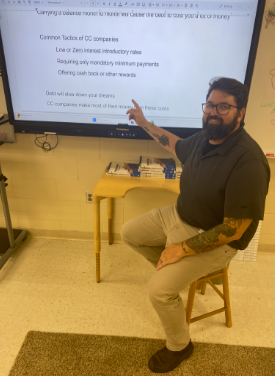 MONEY MANAGED: An informational Personal Finance class taught by Mr. Thomas, here at Melbourne High. With a passion for passing down knowledge, Mr. Thomas has spread useful information to all of his students. In class students learn all the ways that they incorporate Personal Finance into their everyday lives, and important topics that they will take with them in the real world. This class helps prepare students for the future, it even helps them think about all the possibilities. Personal Finance is important because it teaches students about Financial security, ways to build wealth, and avoid debt, as well as other important topics. Mr. Thomas said “I think knowing where money goes says a lot about where we are going.” Personal Finance is helpful because, “Not only with jobs that are financed based, it’ll help with college expenses. There are countless ways that it can help in the real world. Ideally, students should learn how to be mindful when making money decisions.”