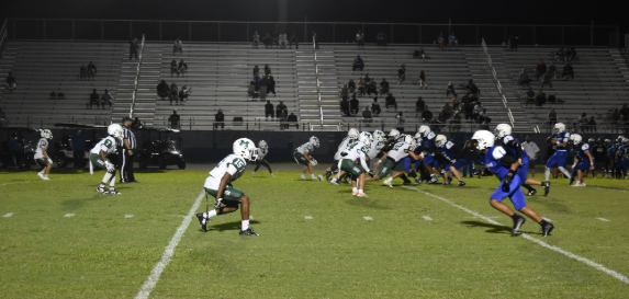 Caption: Marvell Cunningham, steps onto the field representing Melbourne Highs varsity football team, showing determination and school pride as the season unfolds. A standout athlete since freshman year , Cunningham now takes on greater challenges and leadership responsibilities. Balancing academics and athletics, he strives to inspire younger players to push their limits . “It feels amazing to play varsity for Mel High, “Cunningham said .
