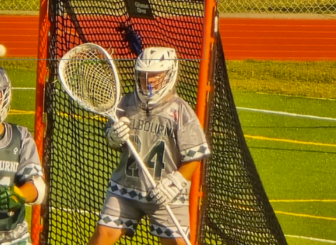 Camden Pearson a Junior at Melbourne High and a Starting Varsity Goalie on the lacrosse team, Standing tall in the goal, this focused lacrosse goalie guards the net with intensity. Locked in and reading the offense, they manage pressure with calm precision. With adrenaline high and the game on the line, they push through every second. "Keeping a positive mindset helps me stay focused even when we're down on points, to try and help my team play better," they say, showing that mental toughness is just as key as skill. Photo By Hunter Paige