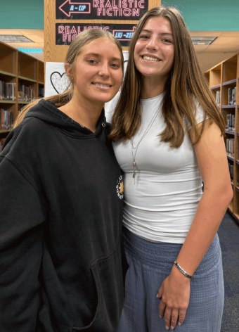 Serving Together: Junior Lauren Deacon shares her experience in the National Honor Society, where she helps the community alongside her friends. Deacon had been involved in NJHS during middle school and continued her passion for service through NHS meetings in Ms. Cara’s room. She also participated in soccer, SWAT, and NTHS while giving back to others. “I get to help the community while being with my friends,” Deacon said. Photo by Lily Majors