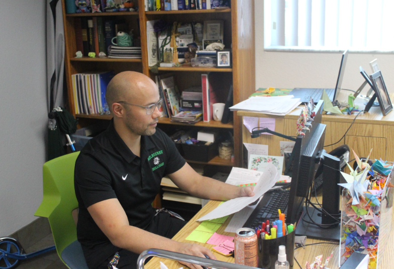 The Culturally Connected Chemist: Mr. David Peck, the former sponsor of the Cultural Connections Club and a current Chemistry teacher here at Melbourne High School, works on further material for his class. The Cultural Connections Club was “...a space where students could celebrate their differences and feel comfortable,” said Mr. Peck. In his own Chemistry Class, he strived for a similar feeling of comfortability. Mr. Peck said that he does “...love being with and helping the student body”, and though his career, even if its not a part of the Cultural Connections Club anymore, he has had the opportunity to do exactly that. Photo By: Aiden Kehayias