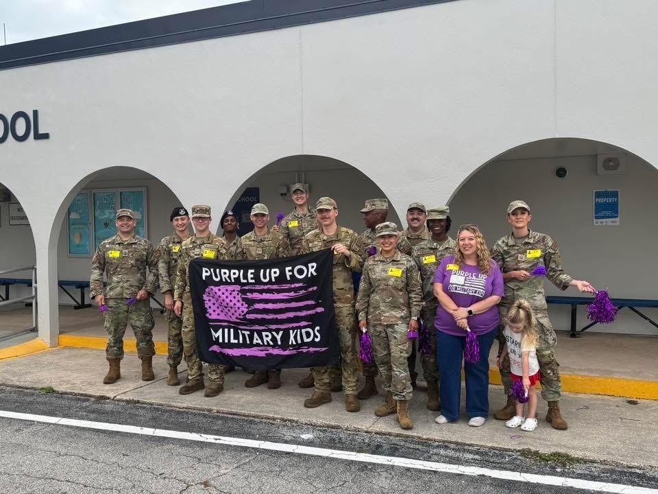 Military parents outside of Holland Elementary