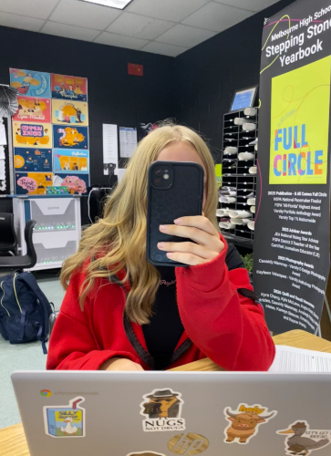 Caught  in a phone-less classroom. 📵 Debating the phone rule at Melbourne High, a  freshmen Paige Allen using the phone for class work showing there can be a balance. In addition '  Julien Díaz says , 'We should be able to use our phones responsibly, especially during lunch.” Allowing us to still be able to be focused in on work but allowing us to still have free time with the phone. Photo by: Madison Davis