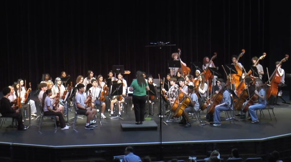 Caption: Practice Makes Perfect: The Intermezzo Orchestra runs their Pre MPA on stage the week before the real performance. This was a trial for the students to see what to improve on and what was worked on enough. Rudhi Jindal, a viola player, states, “Pre MPA definitely showed us what we needed to work on and just gave us a preview of how it's gonna be like on MPA. It was also interesting to hear other orchestras.” Photo by Mr. Paul Jackson