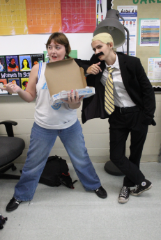 Strike A Pose: Seniors Makalin Elton and Emily King show off their meme-day outfits. The student government voted on spirit week days, then shared them with the rest of the school. Elton enjoyed all of the choices, dressing up as Steve Harvey for meme-day and quoting the man several times. Despite this, there were some other days that she would’ve liked as well. “I wish we could’ve had a teacher student swap day but i still really like the ones we chose,” said Elton. Photo by Kyra Chang