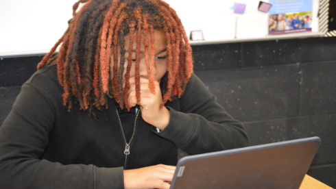 Caption:Cali Copeland studies in the library during the final week of the grading period. Copeland completed missing assignments, reviewed notes, and met with teachers to improve her overall averages before progress reports closed. Copeland  said she wanted to finish the quarter strong and avoid leaving any work incomplete. “I knew I could do better, so I made a plan and stayed on top of every assignment,” Copeland said.
