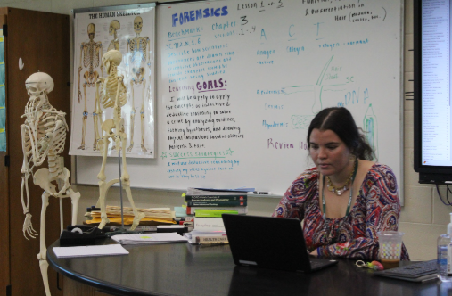 IN THE CLASSROOM: Ms. Ivyanna Rosa teaches the forensics and anatomy and physiology classes this school year in building 10. Ms. Rosa joined the Mel High staff this year. In class, students learned about the subject through PowerPoints and Ms. Rosa explaining. She wanted to remind the students to “believe in yourself and don't let anyone make you feel like your goals are unattainable.” Photo by Ayaana Gupta 