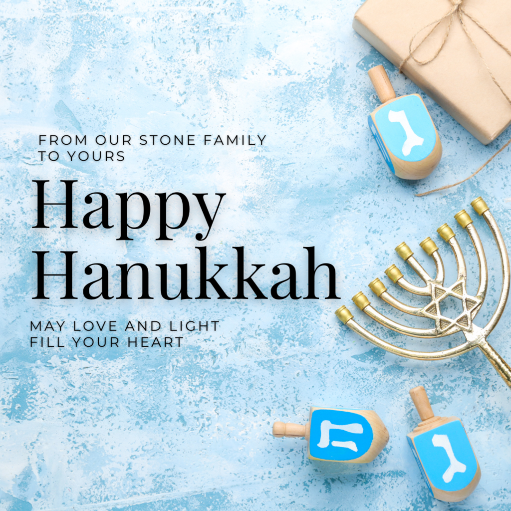 December Happy Hanukkah blue background with the words from our stone family to yours happy hanukkah may love and light fill your heart. includes images of dreidels and a manorah