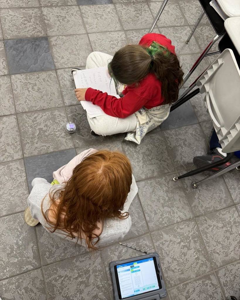 students recording data from using a sphero bolt to measure area and perimeter