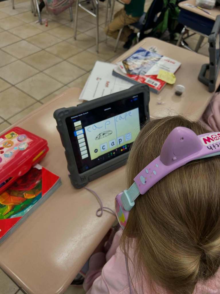 Students using Keynote on the iPad to practice "magic E" and "Short A"