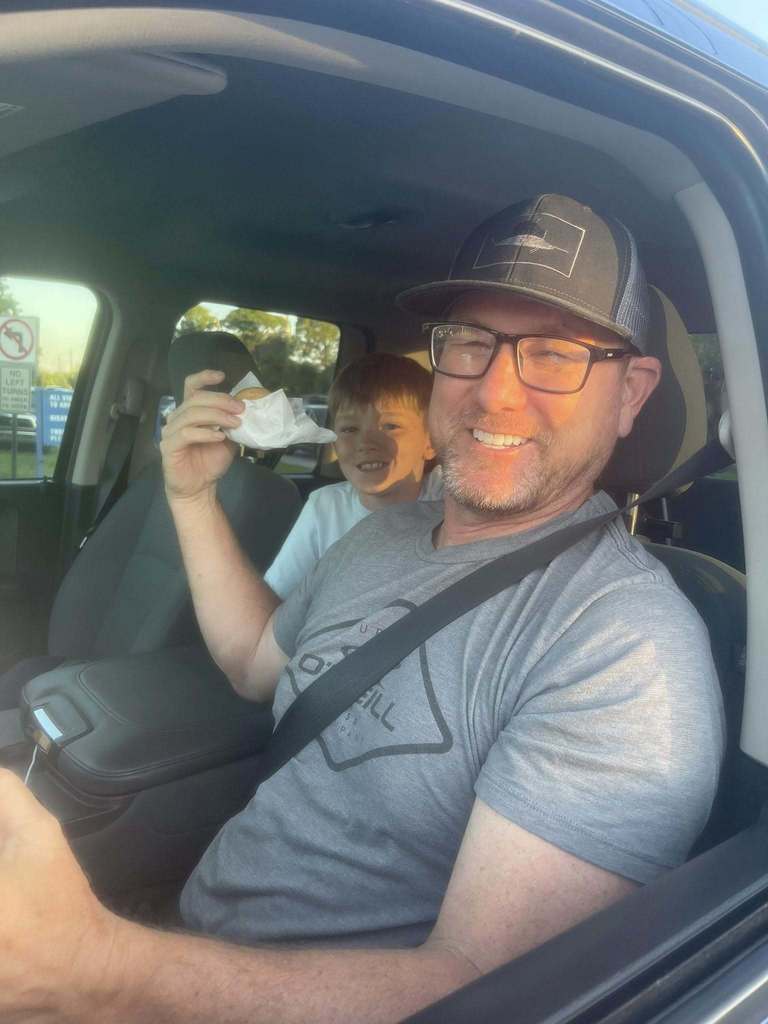 dad at the car window