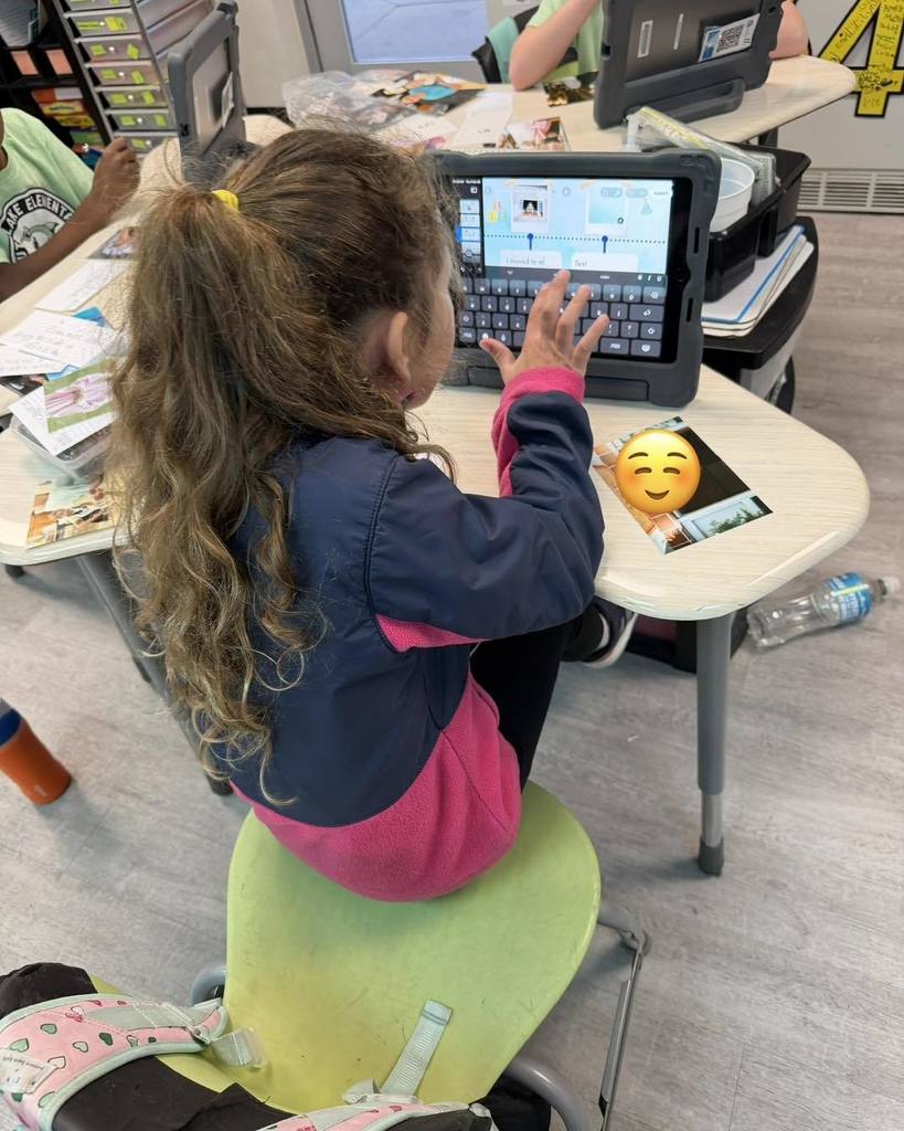 Students using iPads to create their project