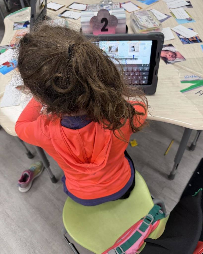 Students using iPads to create their project