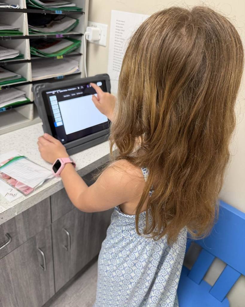 Students using iPads to create their project