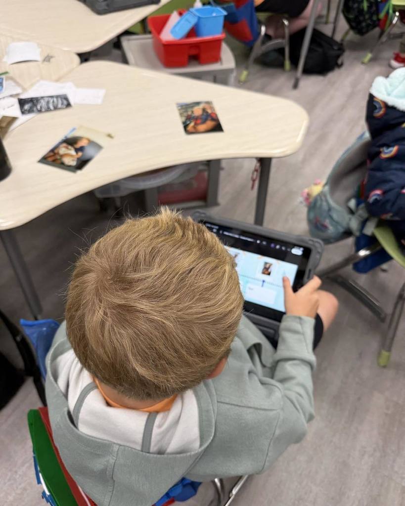 Students using iPads to create their project