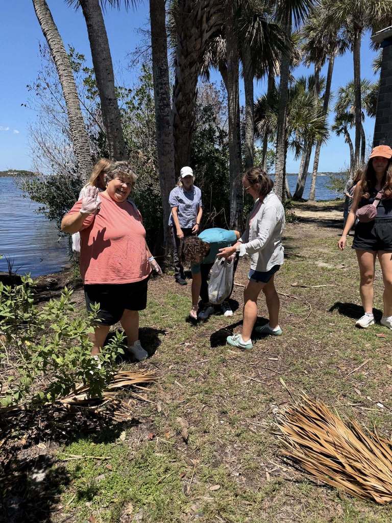 Participants cleaning up trash